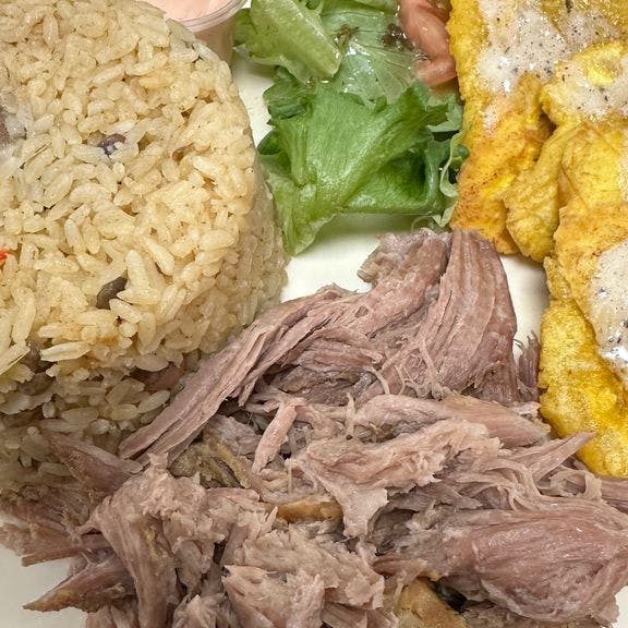 Arroz Con Gandules, Pernil Y Tostones from Goly & Eve in Green Bay, WI