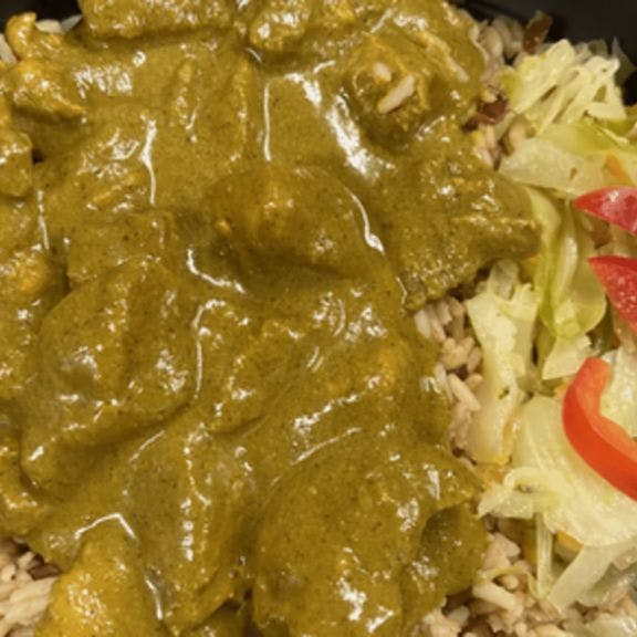 Curry Chicken Boneless rice & beans, cabbage Dinner from Taste of the Caribbean 1 - Capitol Heights in Capitol Heights, MD