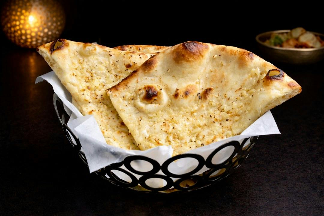 Garlic Naan from Rock N Grill Indian Authentic Cuisine & Bar in Round Rock, TX