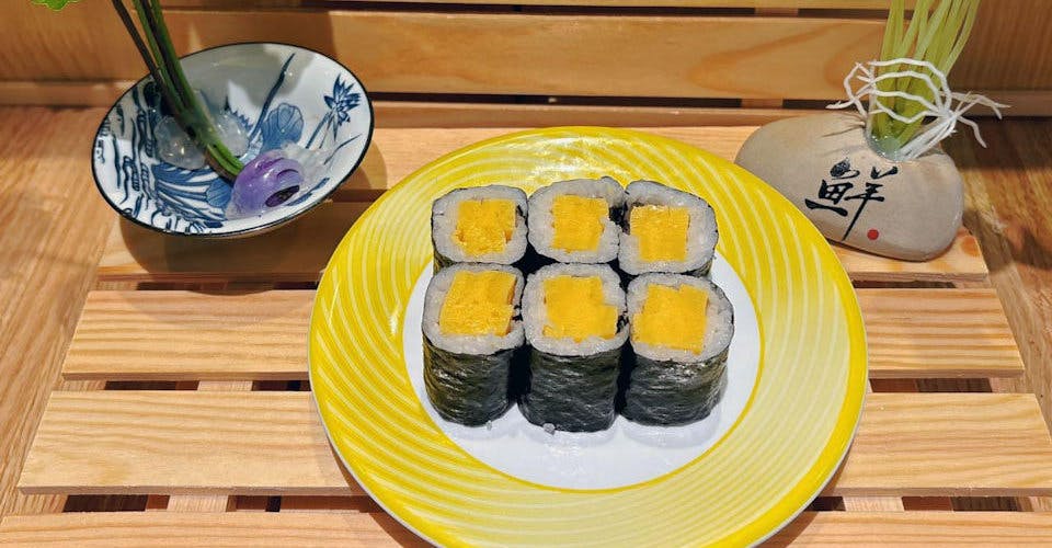 Tamago Maki from Dodomi Sushi Rotary - N Sheridan Rd in Chicago, IL