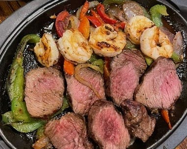 Steak & Shrimp Fajitas from The All American Steakhouse & Sports Theater in Parkville, MD