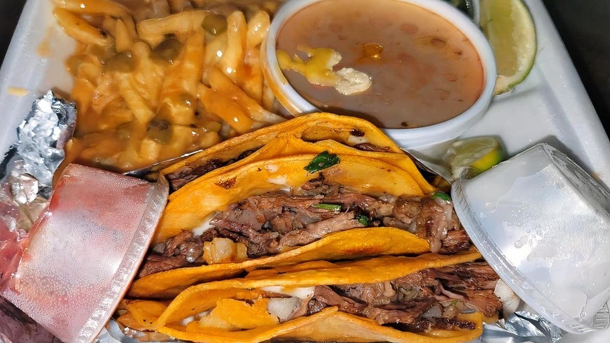 Birria tacos/ Chili fries from Chili Shack in Lakewood, CO