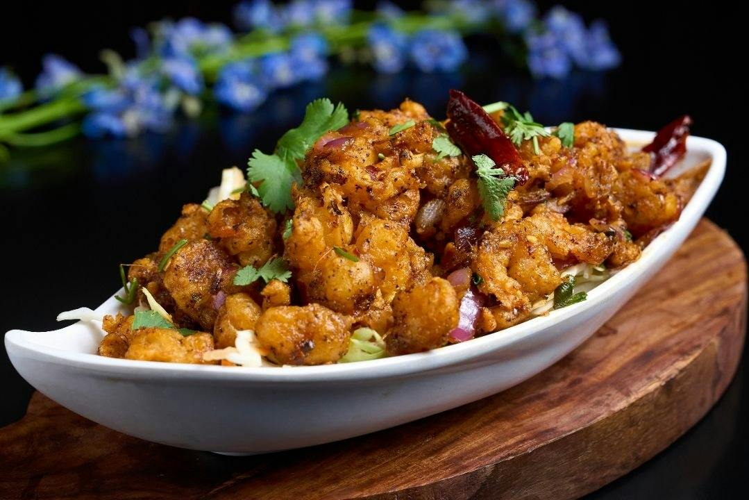 Tossed Spicy Shrimp from Rock N Grill Indian Authentic Cuisine & Bar in Round Rock, TX