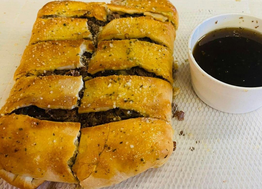 Garlic Beef Roll from Dough Brothers Pizzeria in Cortland, IL