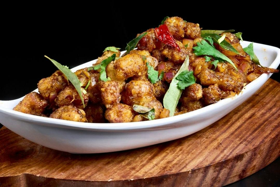 Baby Corn Pepper Fry from Rock N Grill Indian Authentic Cuisine & Bar in Round Rock, TX