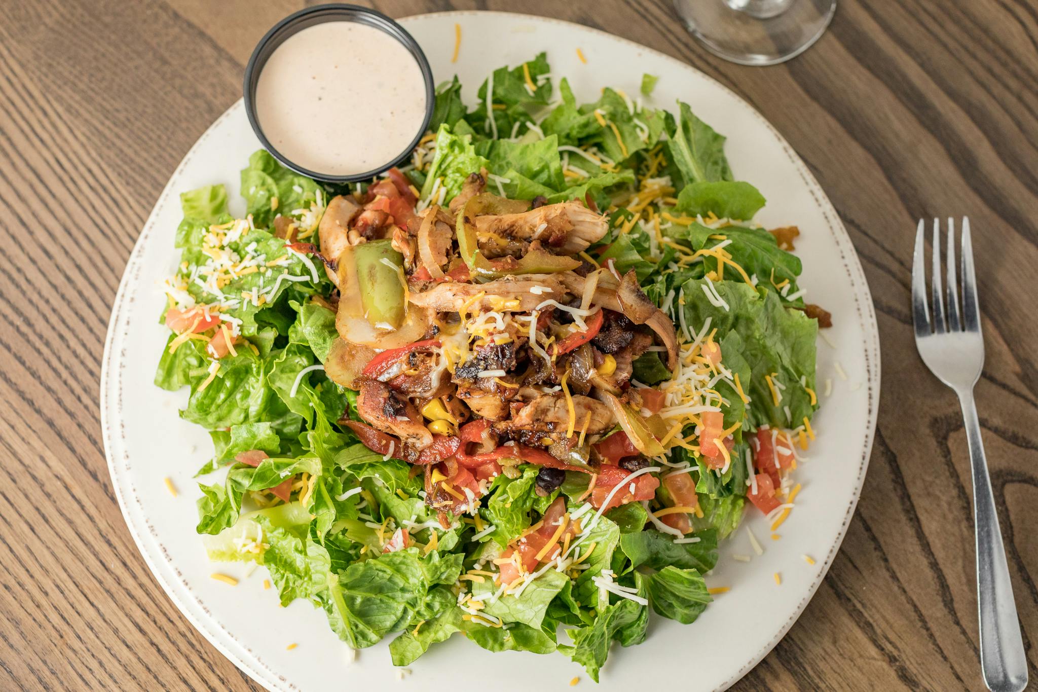 Applewood Bacon & Fajita Chicken Salad from Grizzly's Wood-Fired Grill in Eau Claire, WI