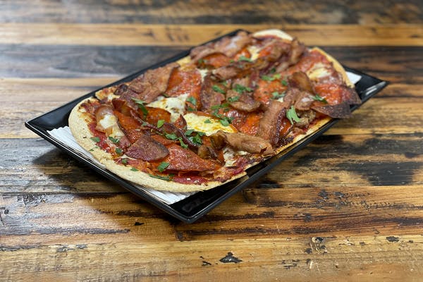 Meatlovers Flatbread from Sip Wine Bar & Restaurant in Tinley Park, IL