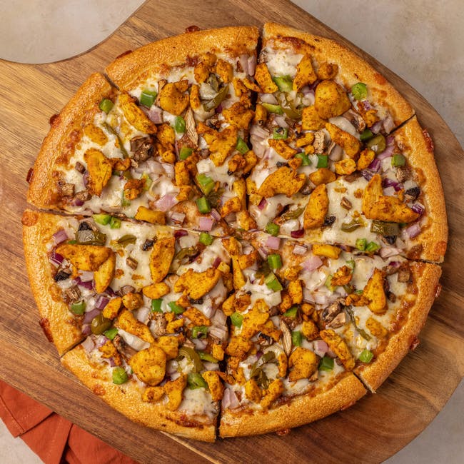 Halal Hyderabadi Spicy Chicken Pizza from Z?s Pizza - NE 8th St in Bellevue, WA