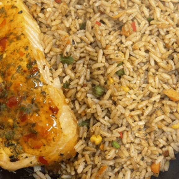 Grilled 8 oz Salmon Dinner rice & beans from Taste of the Caribbean 1 - Capitol Heights in Capitol Heights, MD