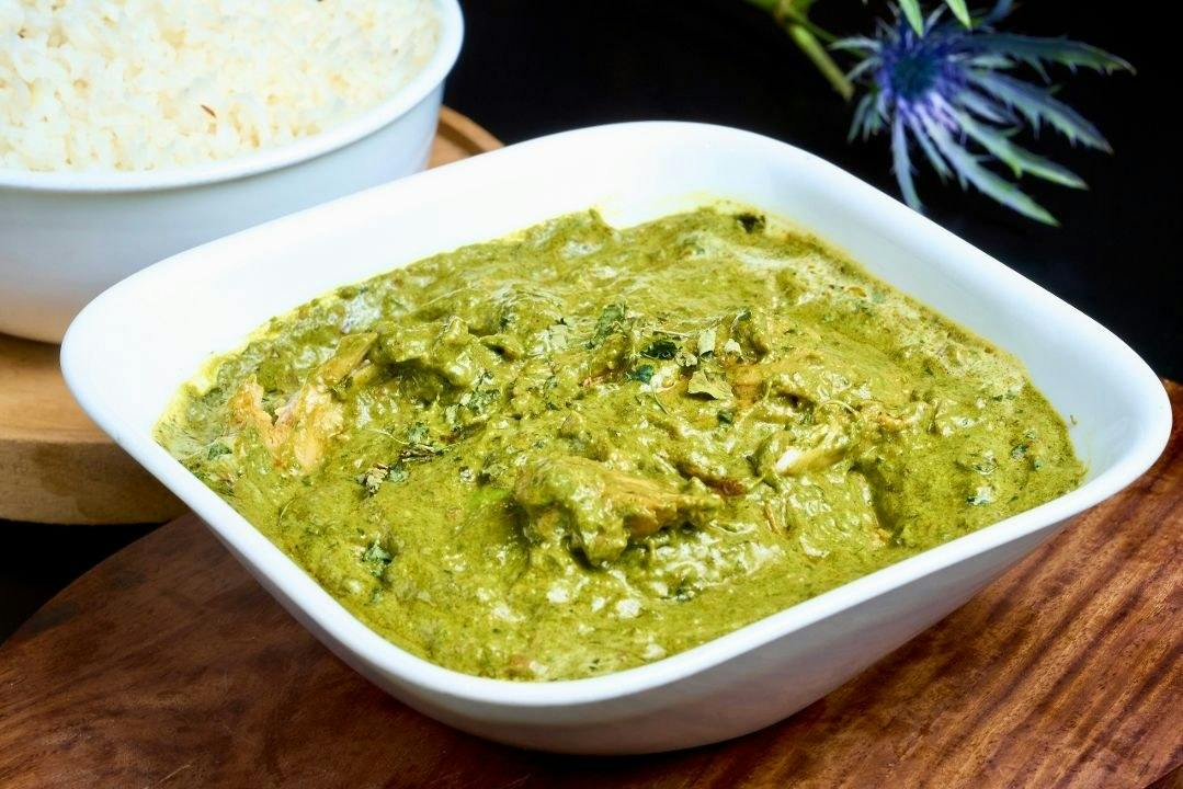 Saag Chicken from Rock N Grill Indian Authentic Cuisine & Bar in Round Rock, TX
