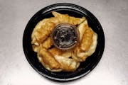 13bb. New Style Deep Fried Pork Dumplings (10 Pieces) from Asian Flaming Wok in Madison, WI