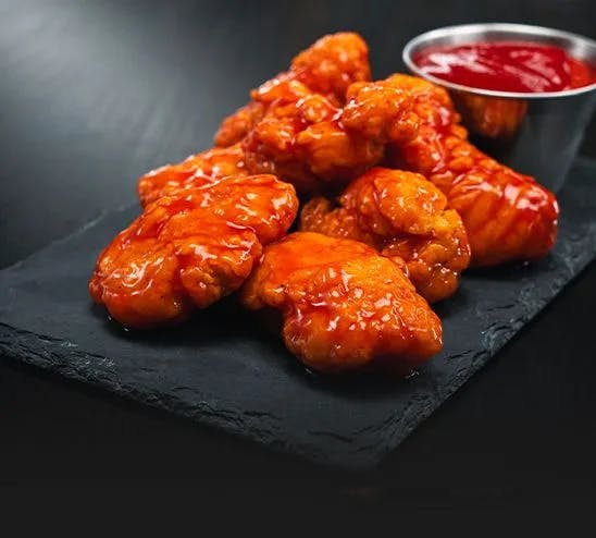 1 LB Boneless Wings from Happy's Pizza in Whitehall, OH