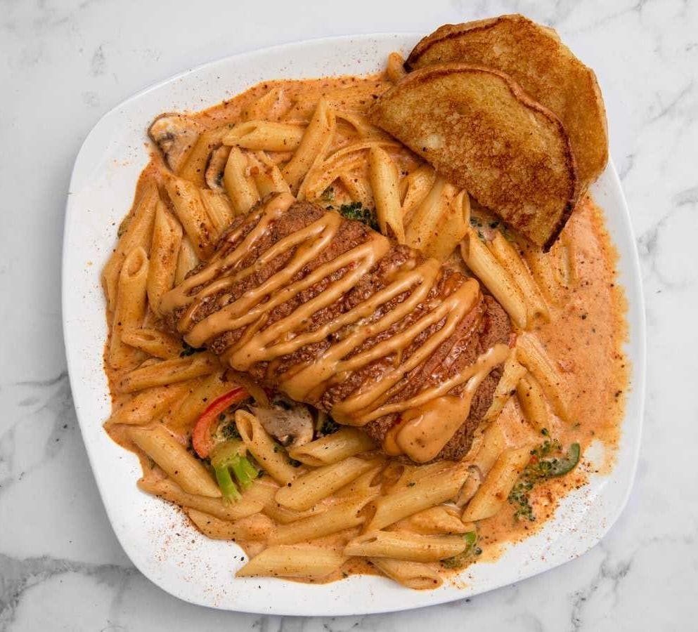 Salmon Alfredo from The Legacy Lounge - Milner Dr in Greensboro, NC
