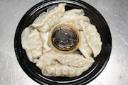 13a. New Style Pan Fried Dumplings (10 Pieces) from Asian Flaming Wok in Madison, WI