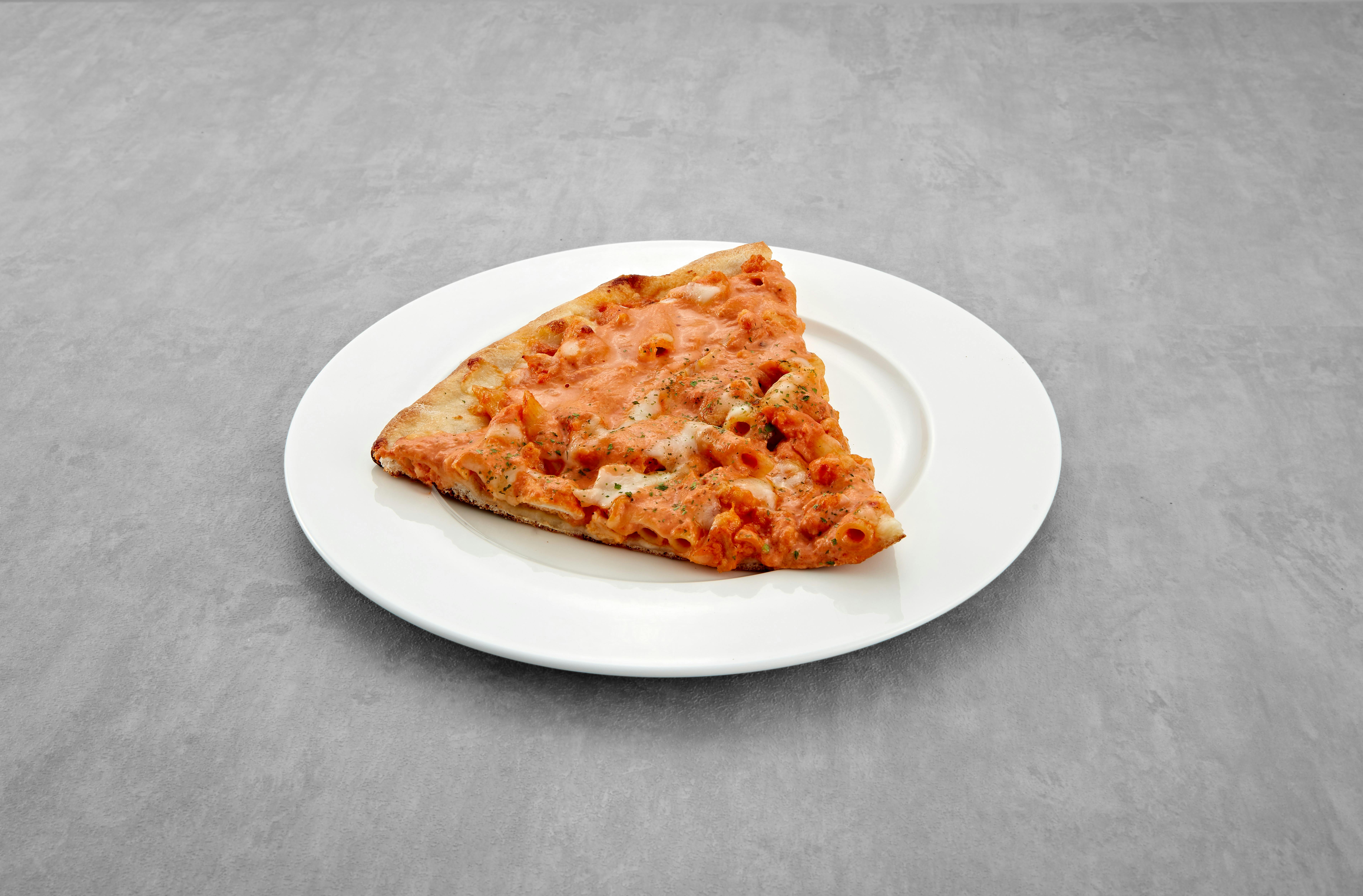 Penne alla Vodka Chicken Pizza Slice from Mario's Pizzeria in Seaford, NY