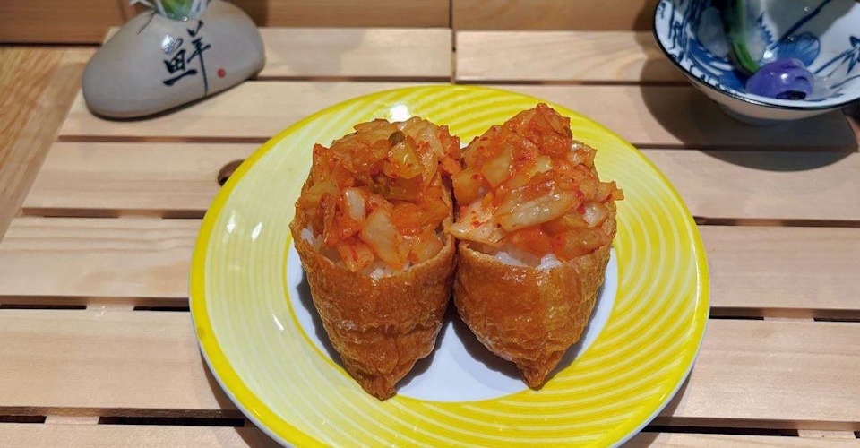 Inari Kimchi Nigiri from Dodomi Sushi Rotary - N Sheridan Rd in Chicago, IL