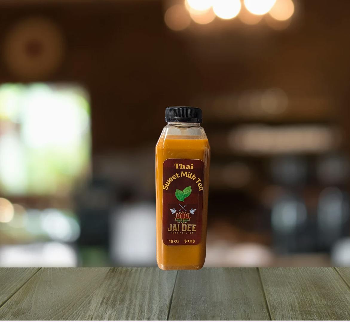 Jai Dee Milk Tea Bottle from Jai Dee Thai Kitchen - Clinton Hwy in Knoxville, TN