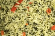 Spinach Rice side order from Taste of the Caribbean 1 - Capitol Heights in Capitol Heights, MD