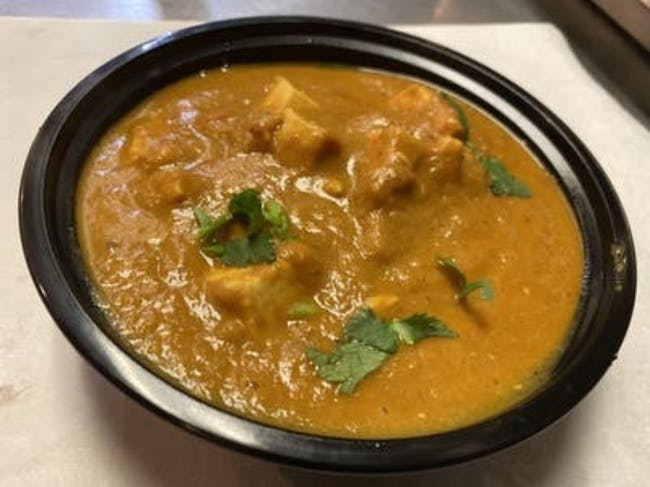 Old Delhi Chicken Curry from Yuva Eats in Olathe, KS