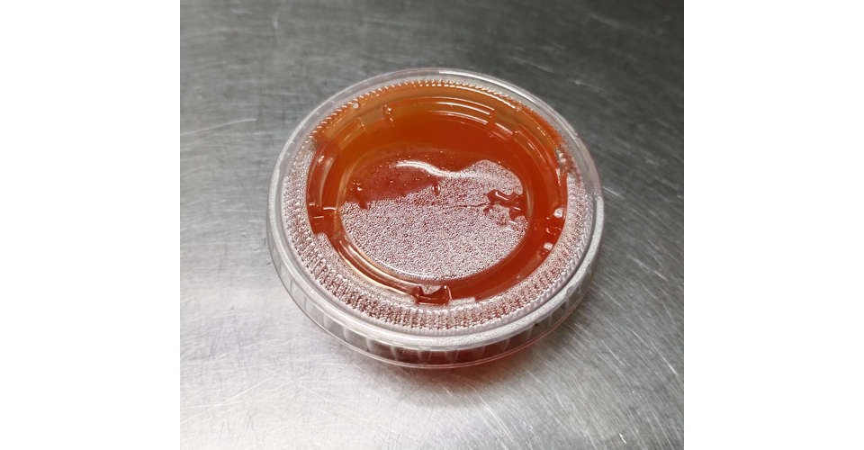 E25. 2 Oz. Homemade Sweet & Sour Sauce from Flaming Wok Fusion in Madison, WI
