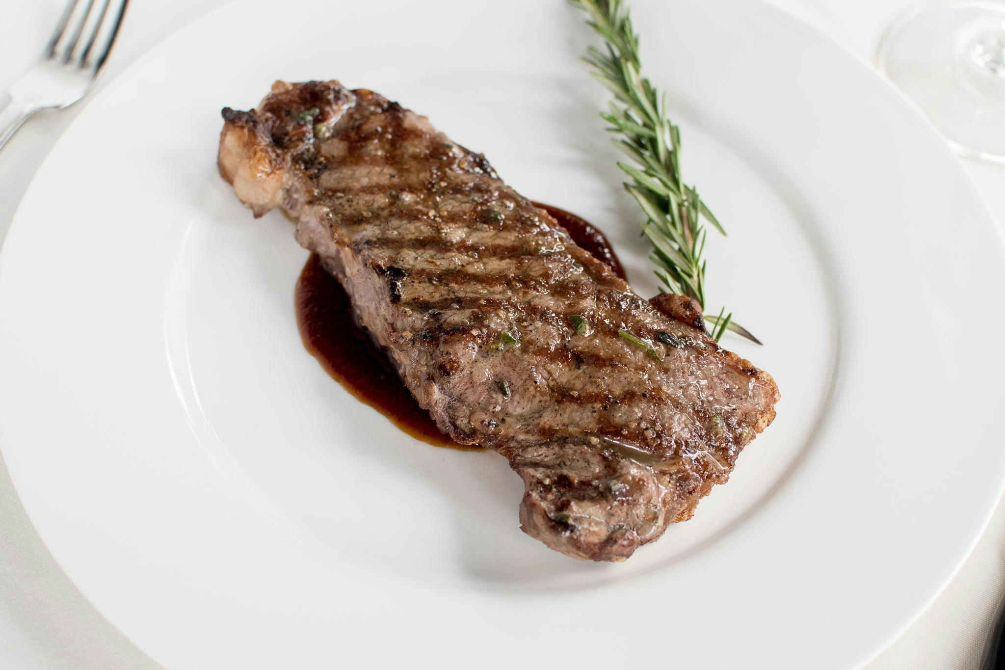 12 oz New York Strip from Johnny Delmonico's Steakhouse in Madison, WI