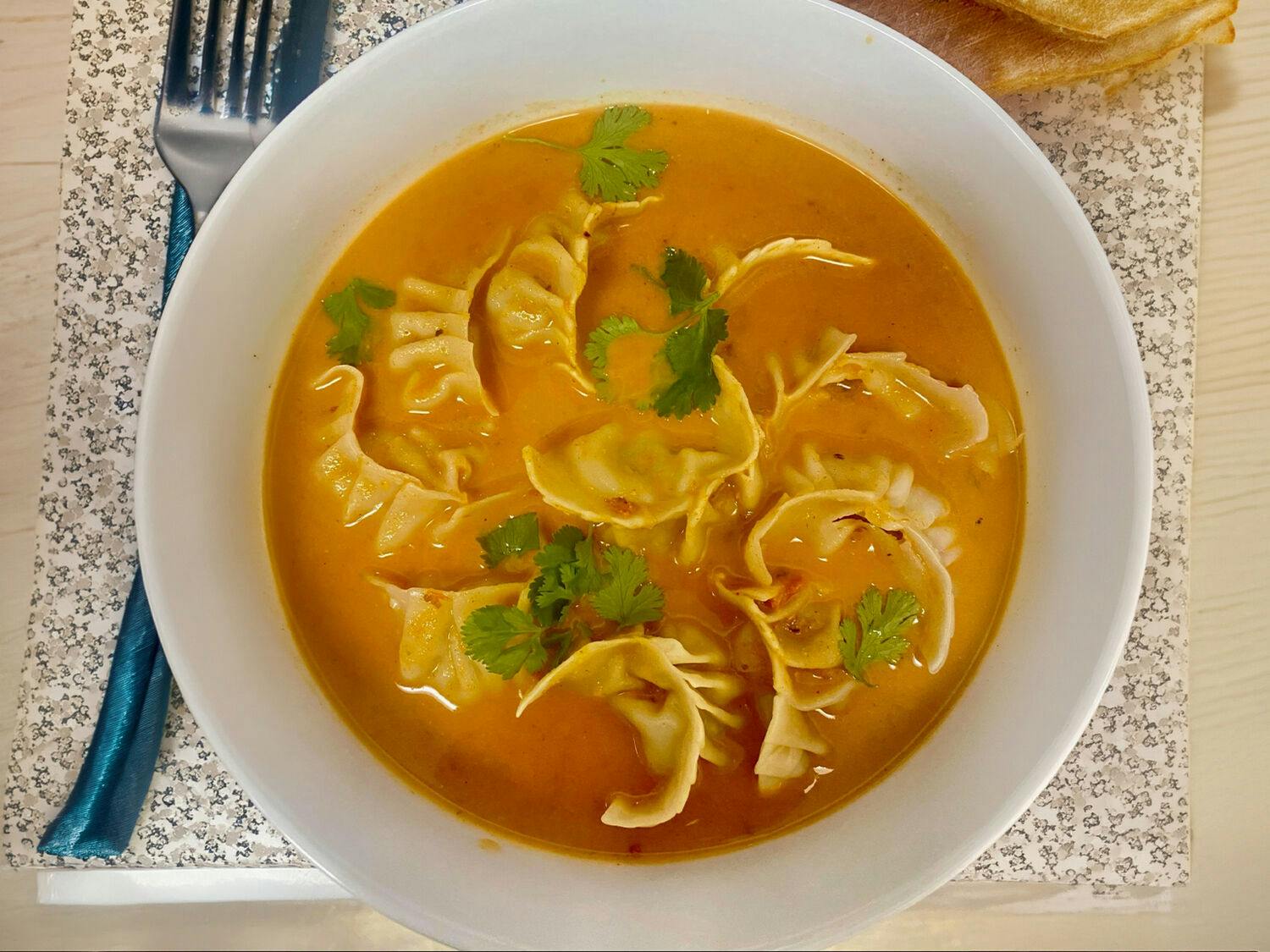 Jhol Chicken Momo from Cumin Fresh Indian Kitchen in Grand Haven, MI