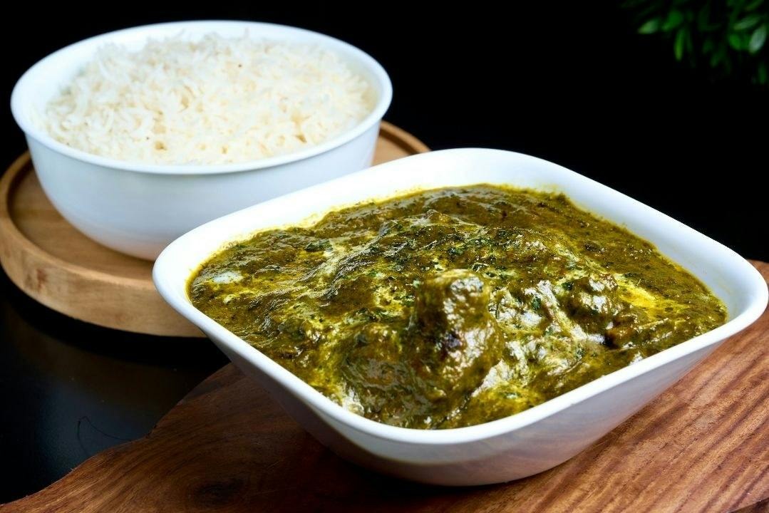 Saag Goat from Rock N Grill Indian Authentic Cuisine & Bar in Round Rock, TX
