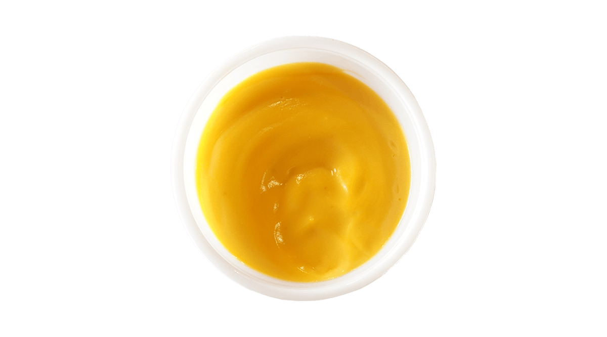 Cheese Sauce from Freddy's Frozen Custard & Steakburgers - Charleston Hwy in West Columbia, SC