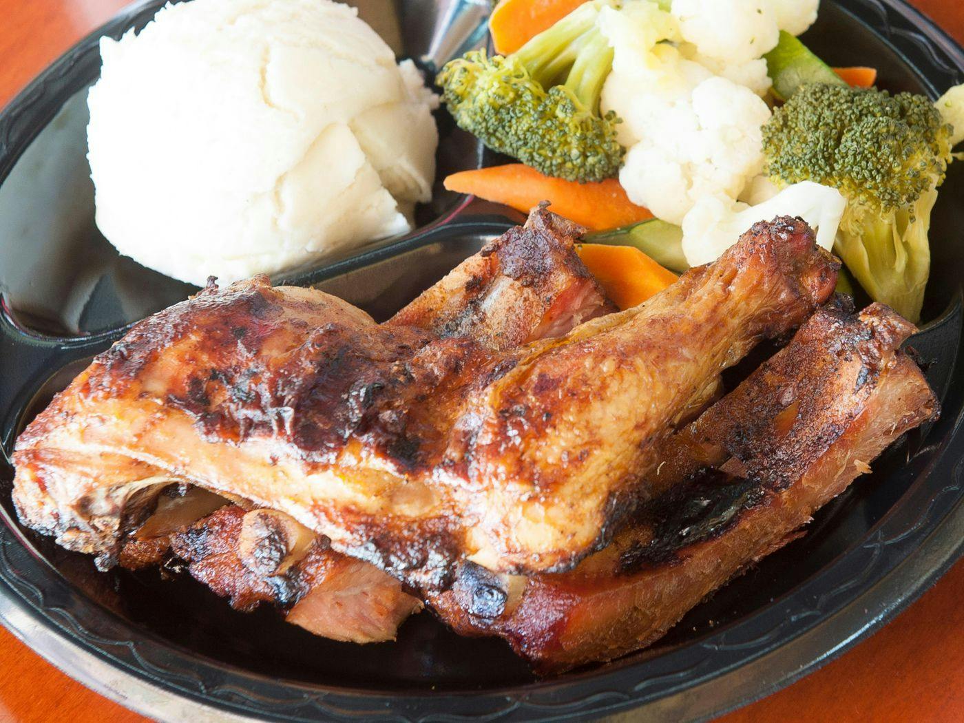 Ribs Baby Back Pork & Dark Meat Grilled Chicken*** from All American BBQ in West Hills, CA