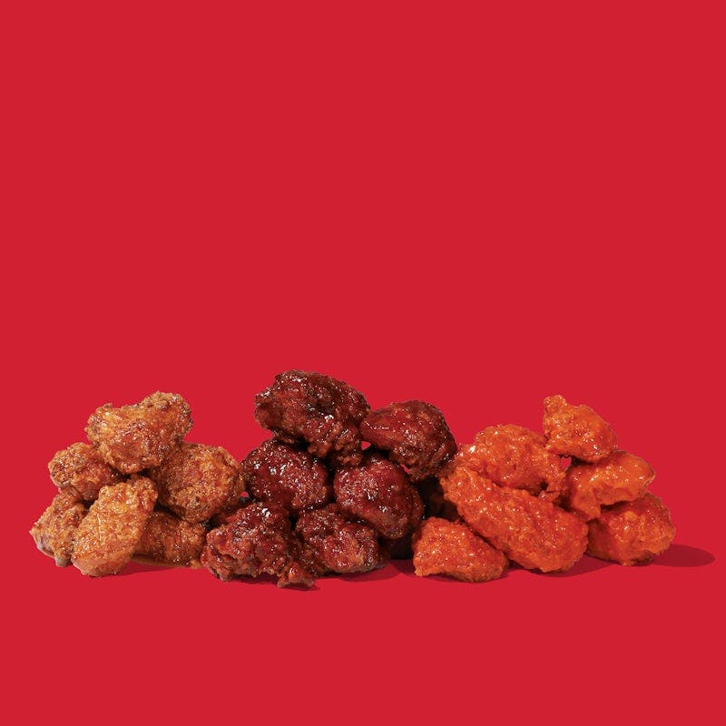 Flight of Saucy Bites from Dave's Hot Chicken - Falls Pkwy in Menomonee Falls, WI