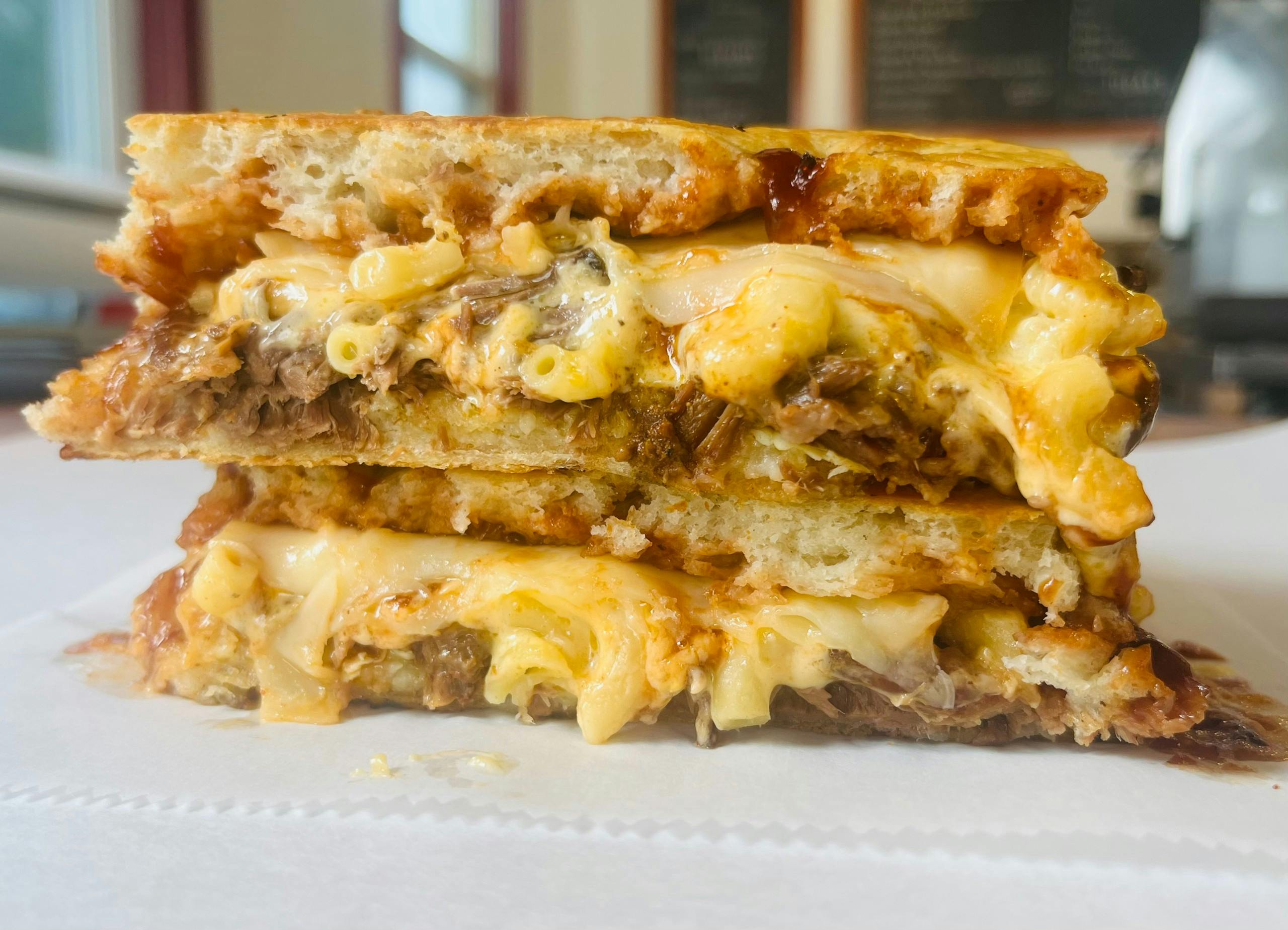 Special Panini- BBQ Beef Mac & Cheese from Arrosto Delicatessen in Sheboygan, WI