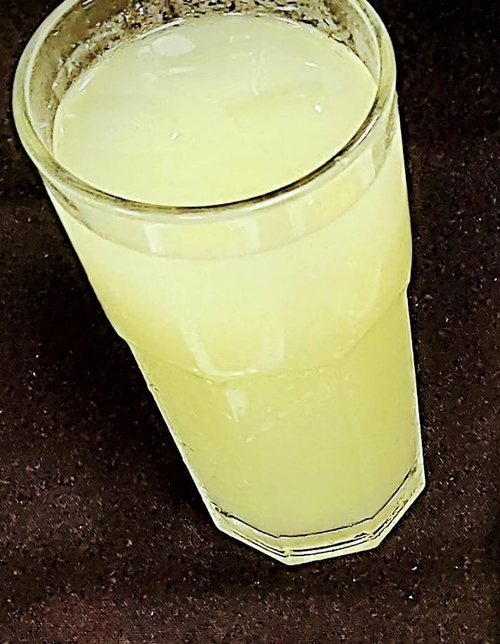Squeezed Ginger Juice from Stango Cuisine in Champaign, IL