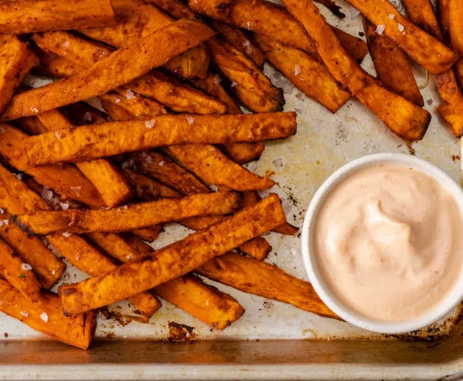 Sweet Potato Fries w/ Roasted Red Pepper Sauce from Justveggiez in Madison, WI