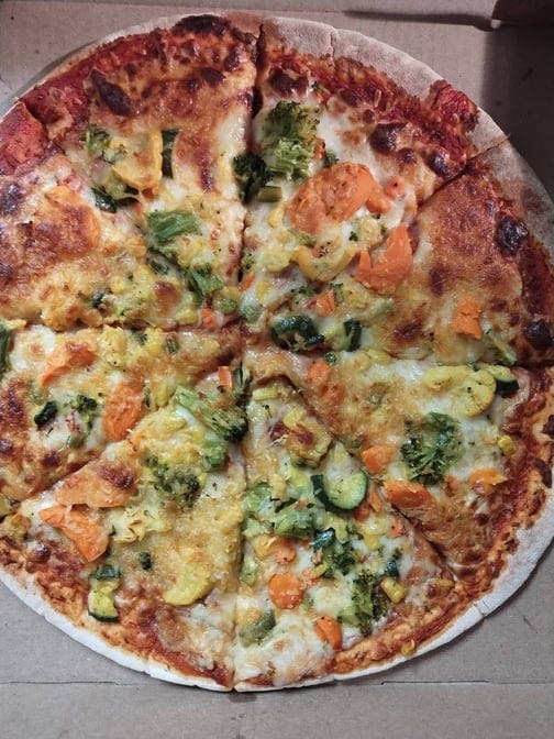 Vegetables Pizza from Planet Bombay in Atlanta, GA