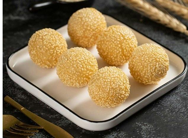 Sesame Balls (8) from Happy Wok - Elmwood Ave in Middleton, WI