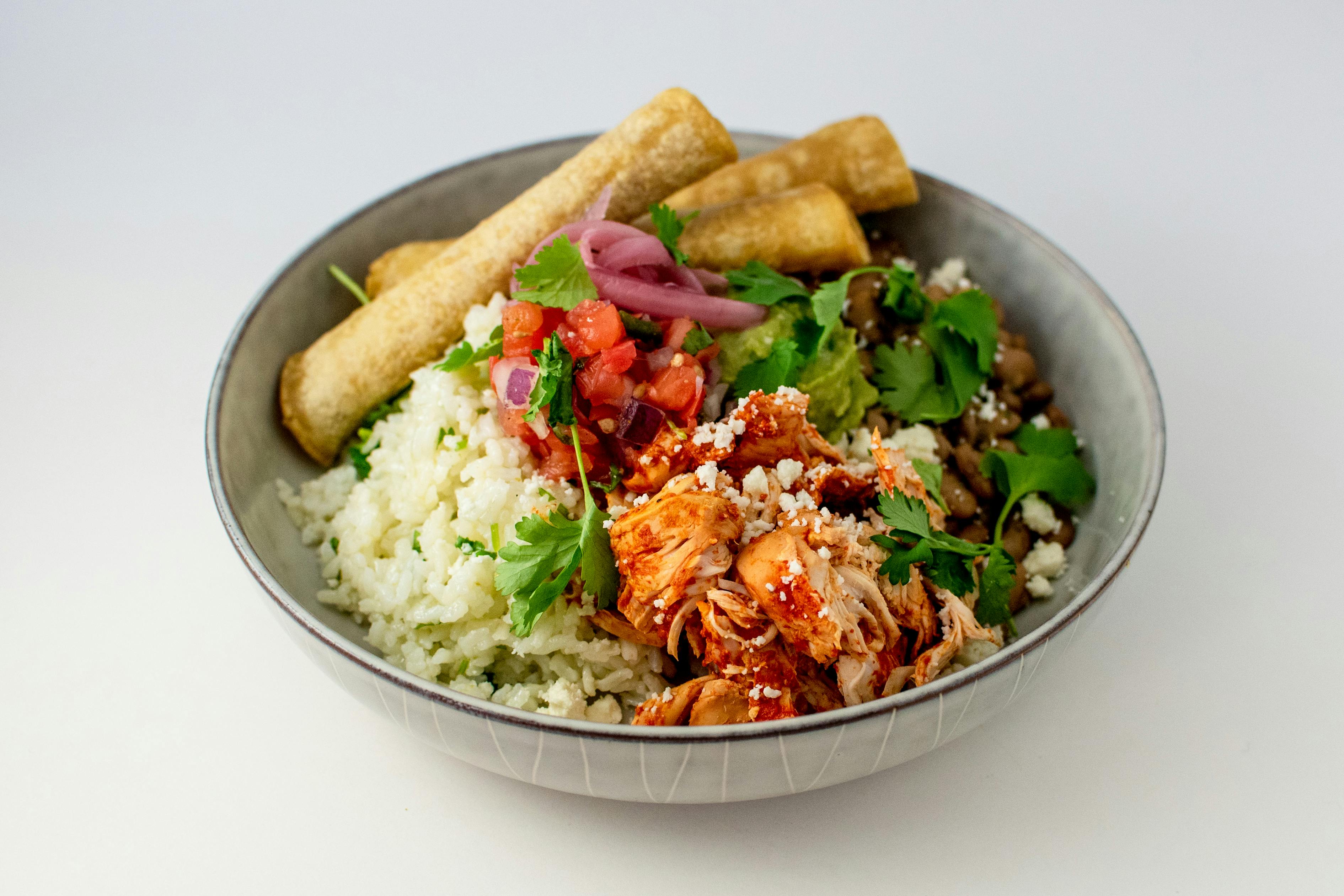 "Shot and a Beer" Chicken Al Pastor Bowl from Taco Royale - N Main St in Oshkosh, WI