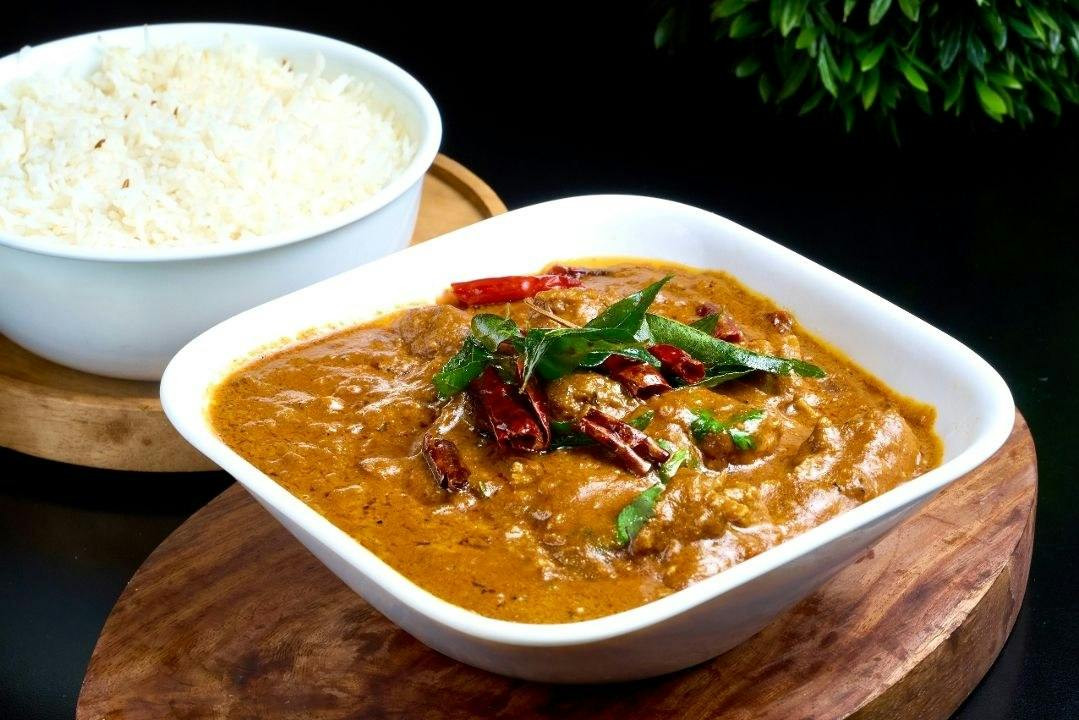 Kozhi Varutharacha Curry (Chicken) from Rock N Grill Indian Authentic Cuisine & Bar in Round Rock, TX