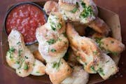 Savory Roasted Garlic Knots from We The Pizza Ballston - Wilson Blvd in Arlington, VA