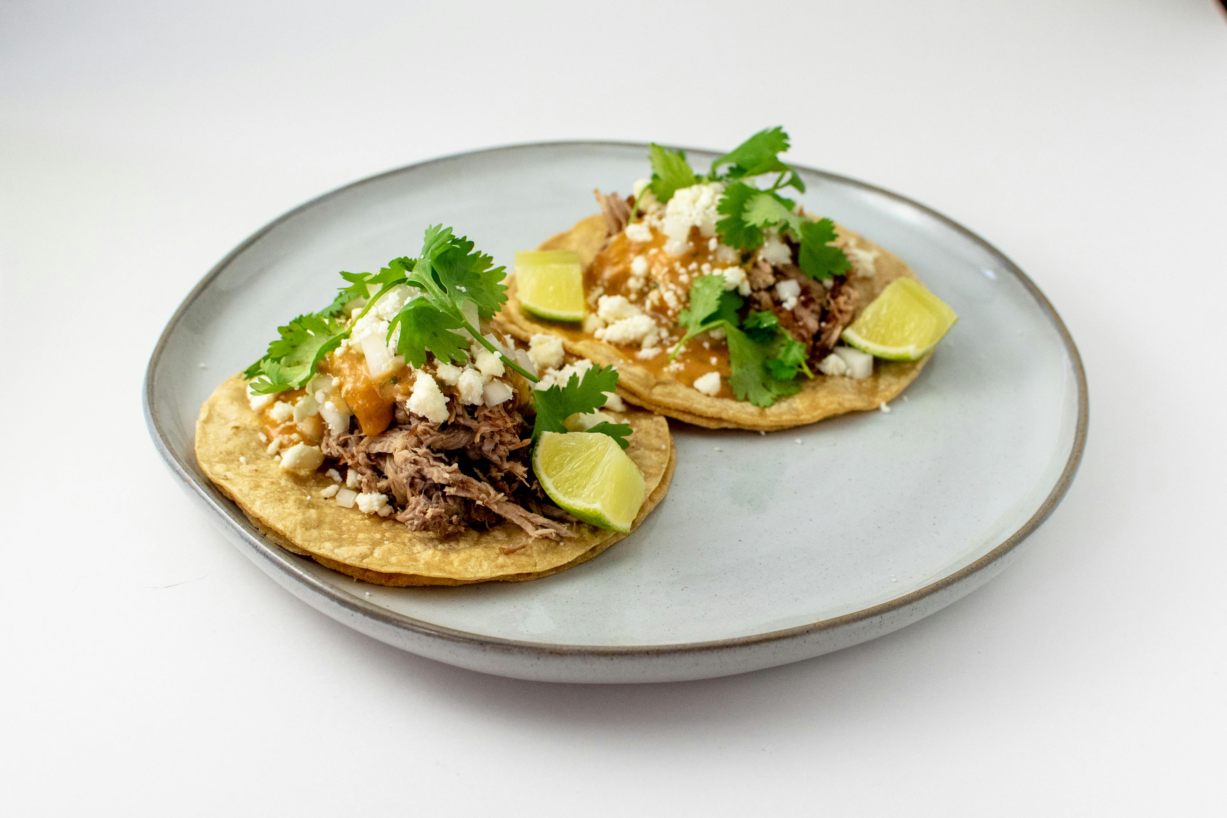 Cola Braised Pork Carnitas Tacos from Taco Royale - N Main St in Oshkosh, WI