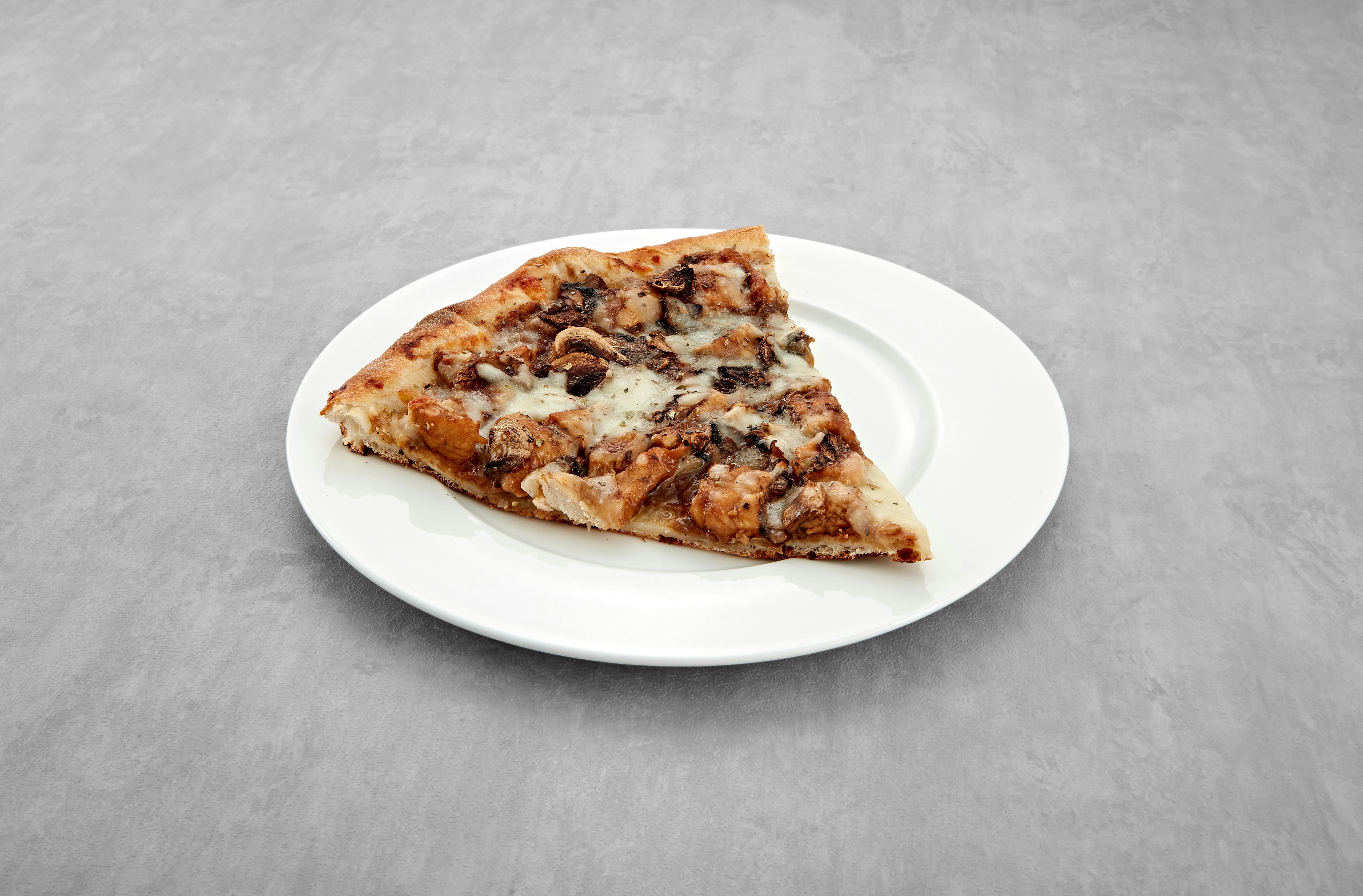 Chicken Marsala Pizza Slice from Mario's Pizzeria in Seaford, NY