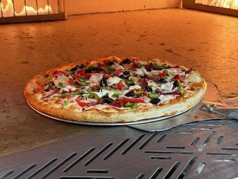 12" Small Deluxe Supreme Pizza from Legends Pizza - Wolf Rd in Colonie, NY