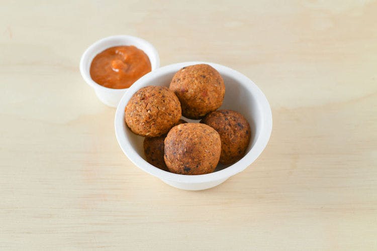 Warm Chickpea Meatballs (contains nuts) from Clover Grains and Greens - State St in Madison, WI