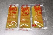 SS4. 3 Packets of Hot Mustard from Asian Flaming Wok in Madison, WI