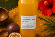 Passionfruit 16oz from C'est Bon Caribbean Creole Cuisine in Baytown, TX