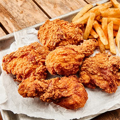 12 Piece Fried Mixed Dark Chicken + Wedges from Happy's Pizza in Whitehall, OH