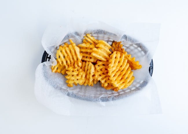 Waffle Fries from Capo's Cheesesteak Hoagies & Grill - E Grand River Ave in East Lansing, MI