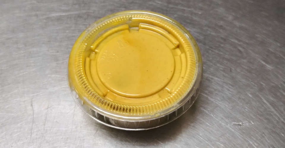E14. Homemade Mustard (2 oz.) from Flaming Wok Fusion in Madison, WI