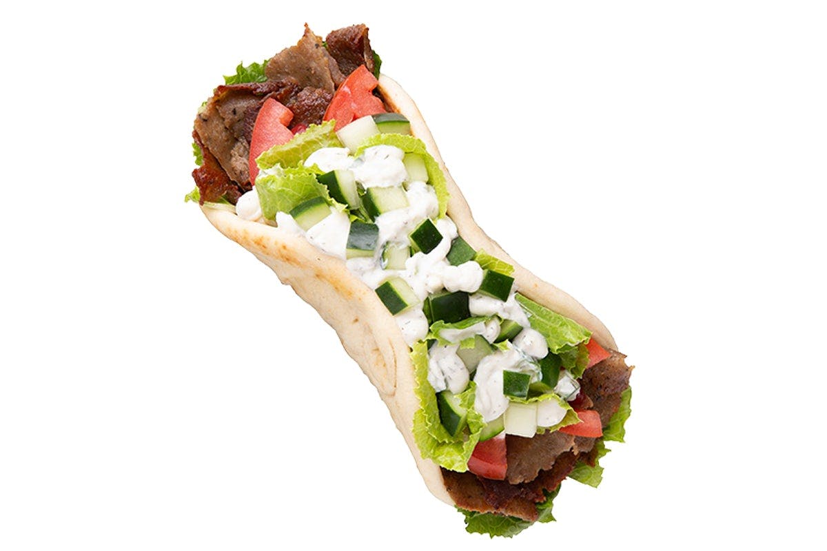 Traditional Gyro - The Traditional Way - With Romaine Lettuce, Tomatoes, Pickled Onions Tzatziki topped with Feta Cheese. from Garbanzo Mediterranean Fresh - W Colfax Ave in Lakewood, CO