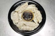 12b. New Style Steamed Chicken Dumplings (10 Pieces) from Asian Flaming Wok in Madison, WI