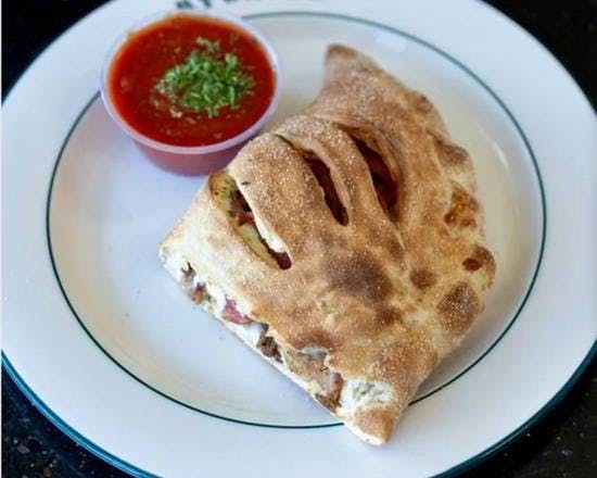 Meat Lovers Calzone from Ameci Pizza & Pasta - Lake Forest in Lake Forest, CA
